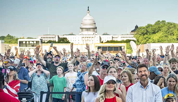 Photo of people attending the Rededicate 250 event in front of the Capitol building on the National Mall in Washington, D.C.