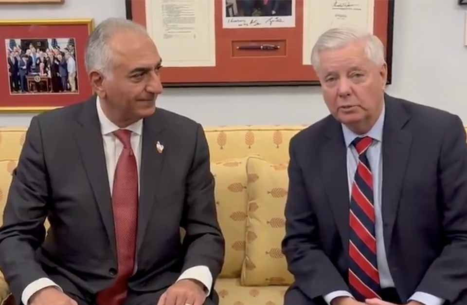 A photo of Senator Lindsey Graham sitting on a couch with Pahlavi Reza, the exiled crown prince of Iran.