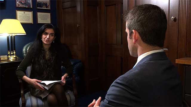 A VOA reporter interviews a member of the U.S. Congress.