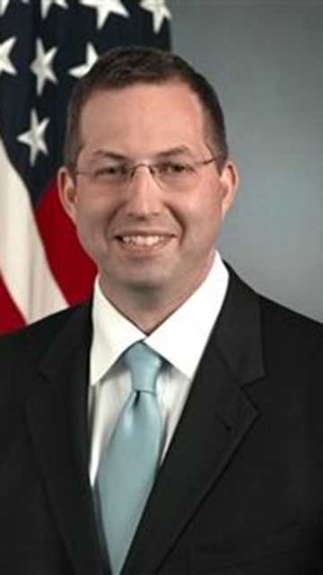 Portrait of Derek Mitchell.